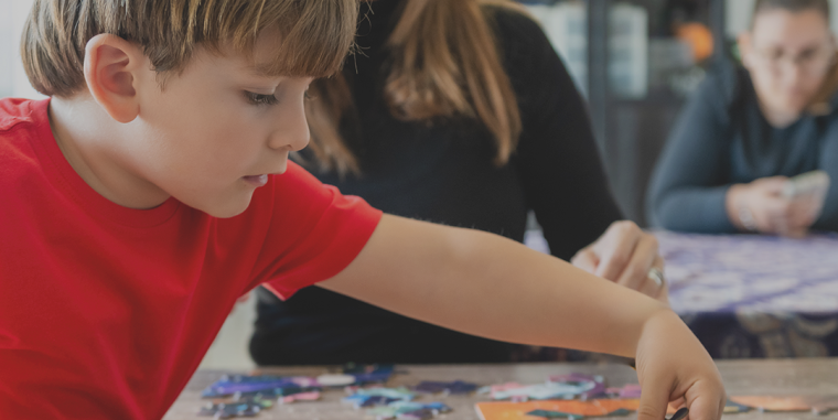 Child engaging in puzzle activity during ABA therapy at Neuro Spark.